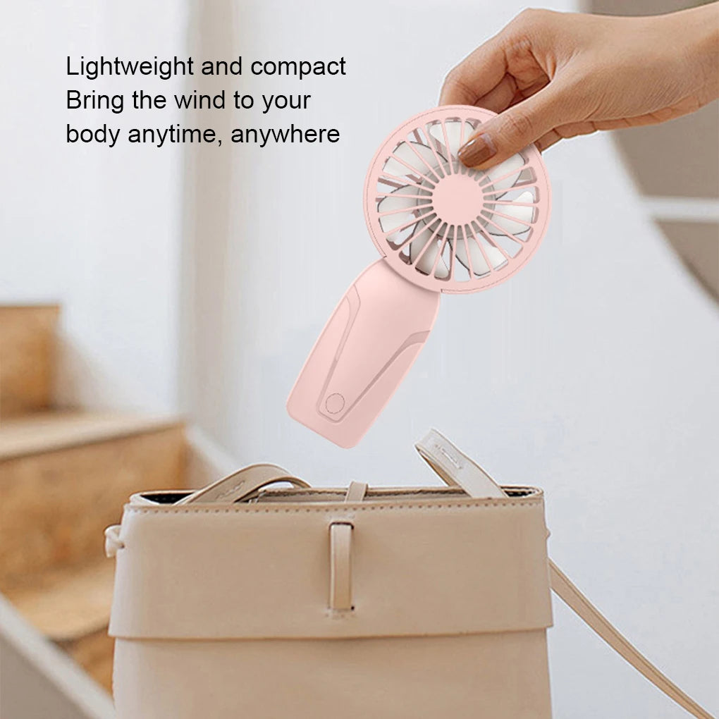 Mini ventilatore tascabile portatile leggero ricaricabile tramite USB, per rinfrescarsi in movimento.